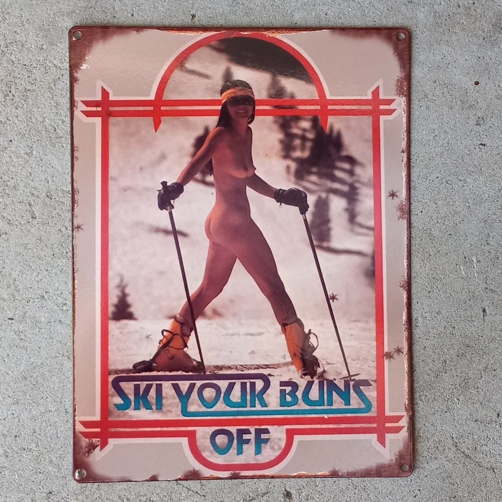 Vintage 'Ski Your Buns Off' Metal Sign Mountain Cabin Humorous Decor Reproductio